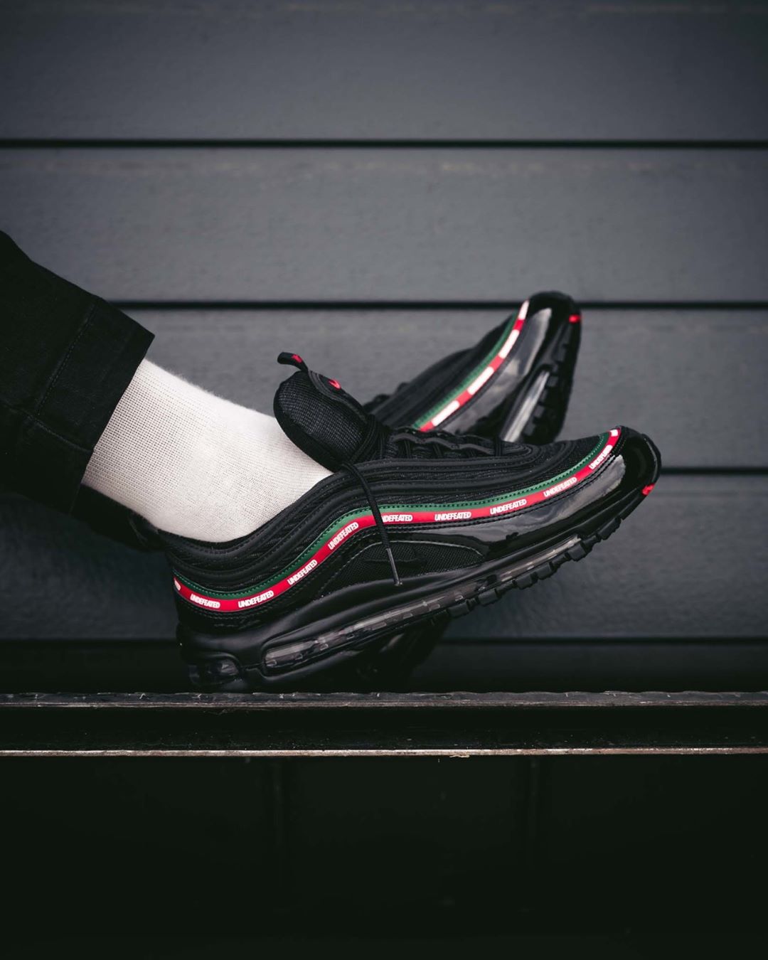 nike undefeated harga