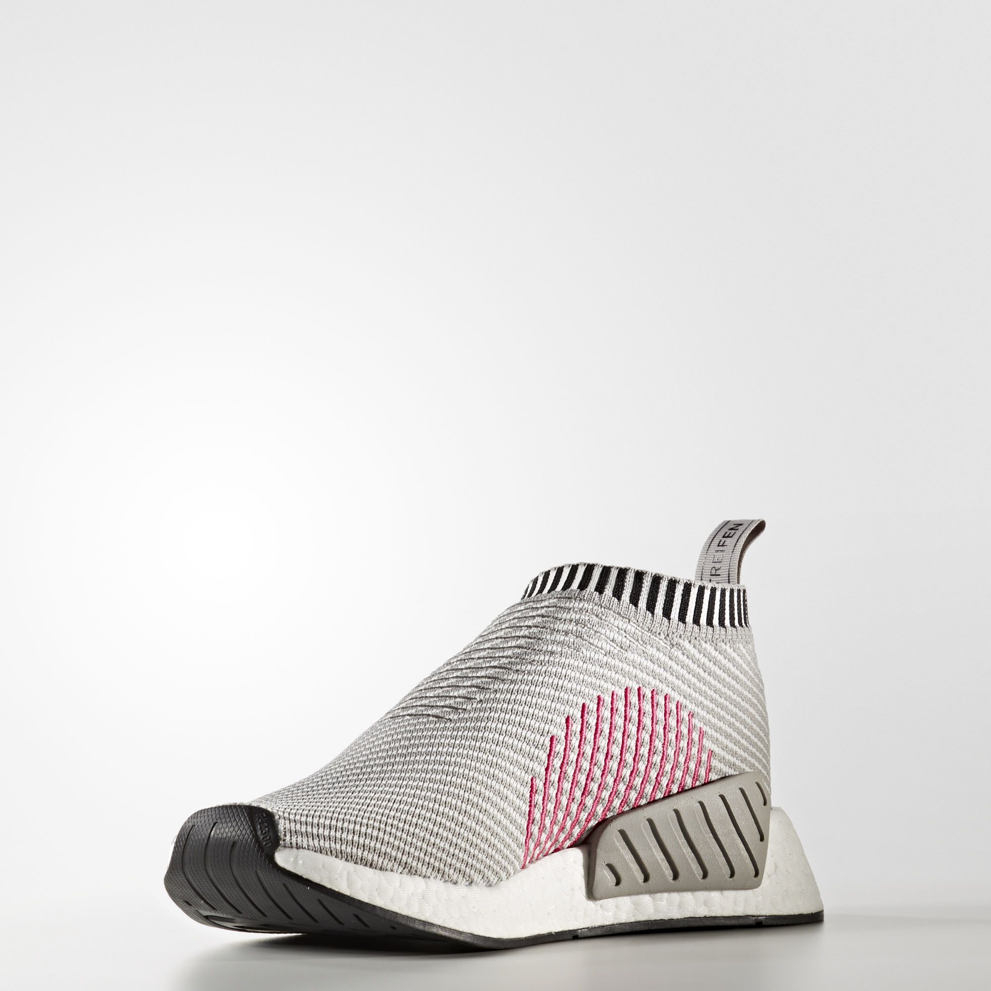 Adidas NMD_CS2 Primeknit
Footwear White / Shock Pink
