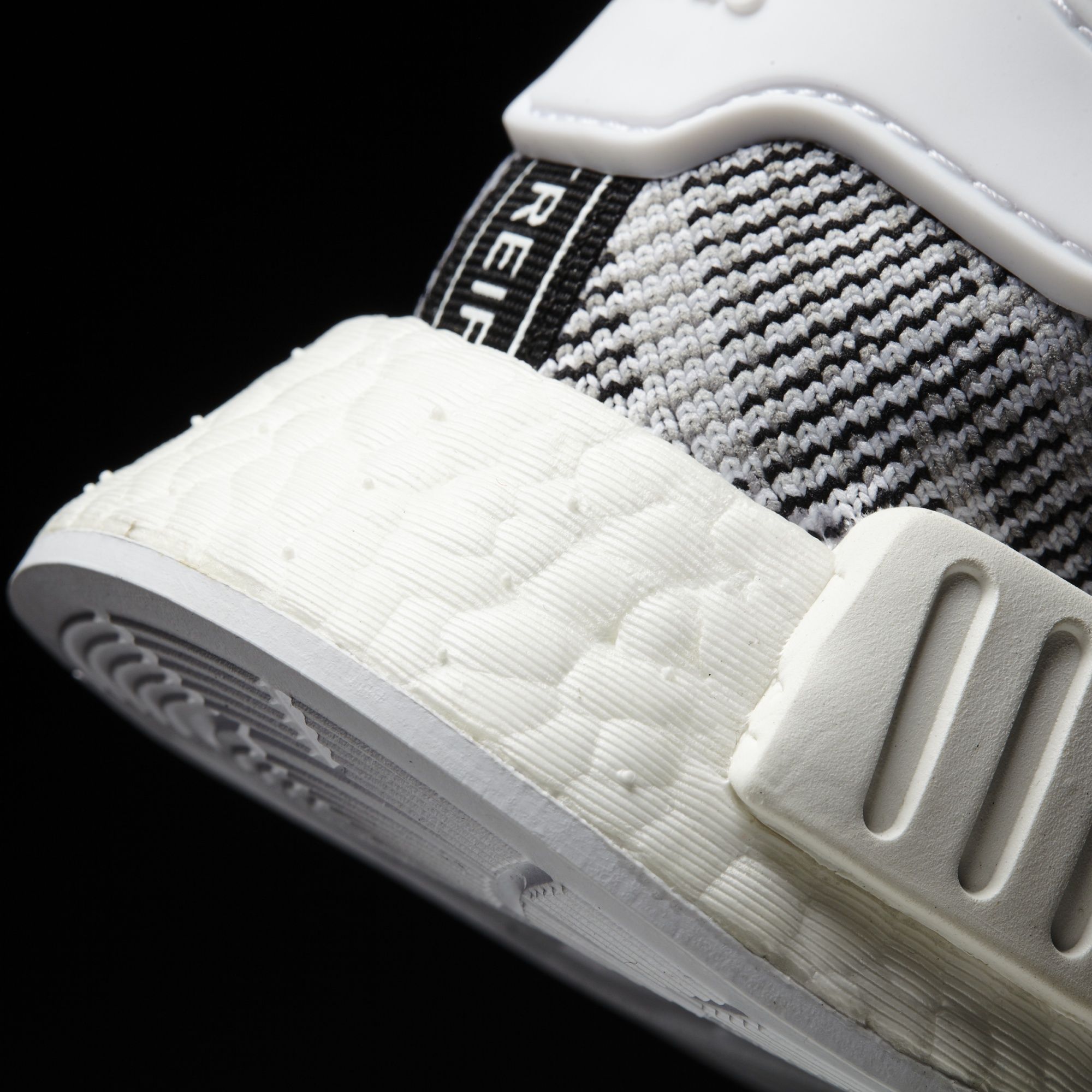 Adidas NMD_R1 Primeknit
Footwear White / Core Black
