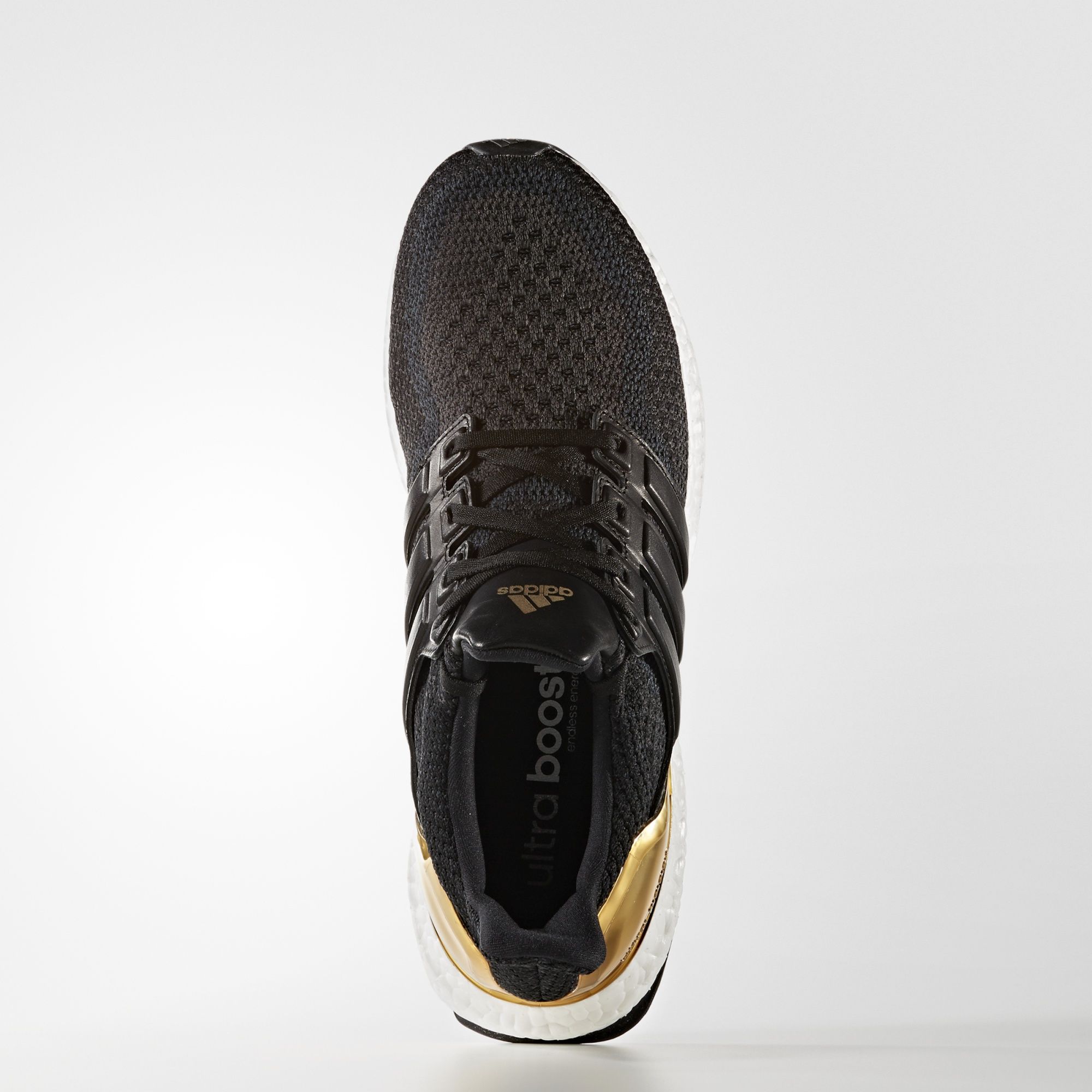 Adidas Ultra Boost LTD
Core Black / Kurz Gold Foil 