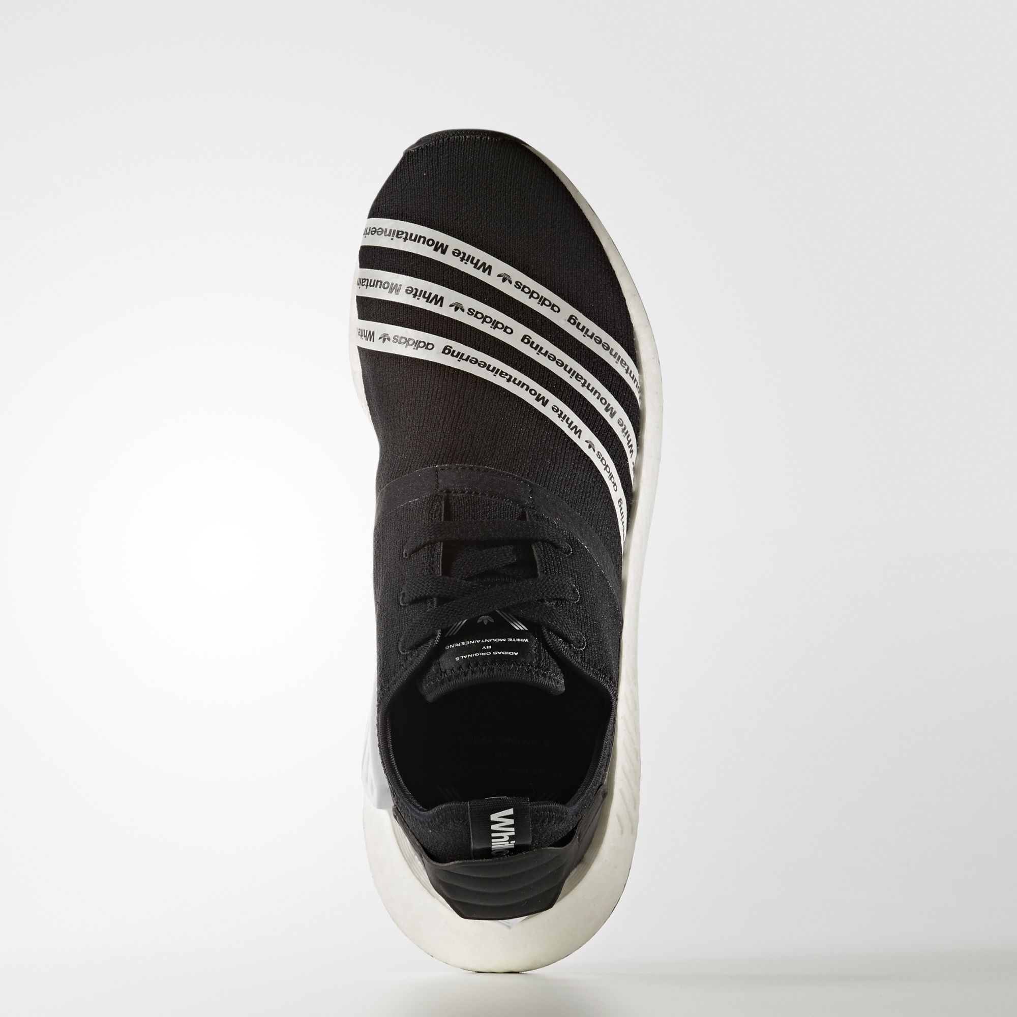 Adidas x White Mountaineering NMD_R2
Core Black / Footwear White