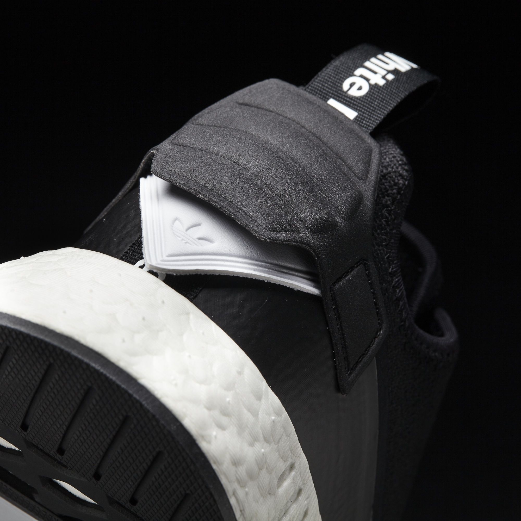 Adidas x White Mountaineering NMD_R2
Core Black / Footwear White